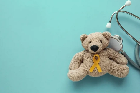 Teddy mit gelber Schleife Aufruf zur Spende zu gunsten der Deutschen Krebshilfe